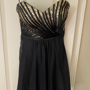 Black and gold mini dress